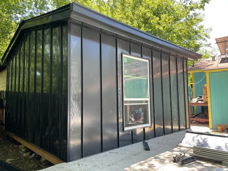 Black standing seam metal wall panels for Roof Inspection in Thousand Palms